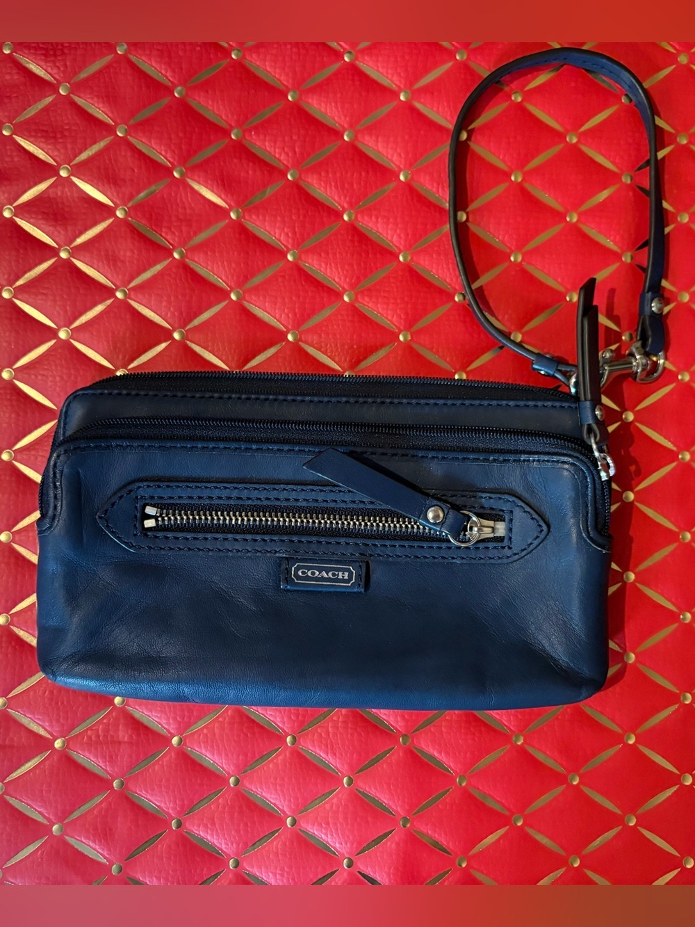 Coach navy leather belt bag with wrist strap